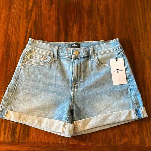 NWT 7 For All Mankind cuffed shorts. They do have stretch Size 27