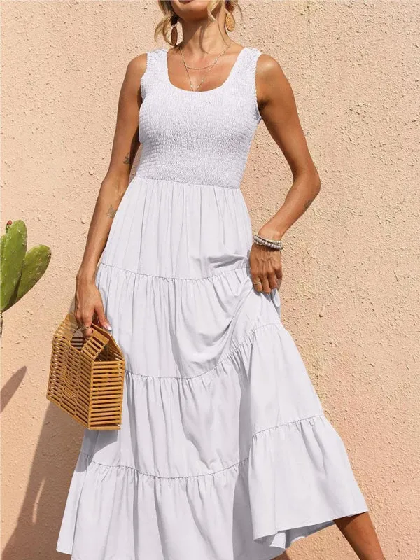 Smocked Bodice Maxi Dress with Tiered Skirt and Pleated Panels